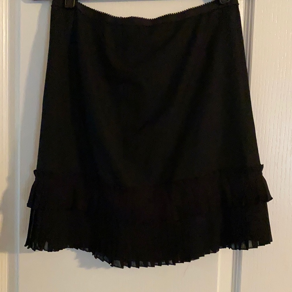 Black The LimitedLuxe pleated black skirt.